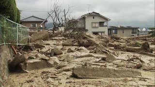 At least 36 dead as Japan landslides engulf homes