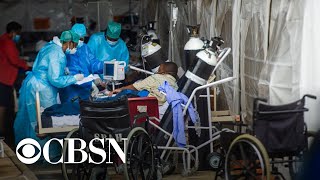 COVID-19 variant detected in U.S. for first time as another spreads across the country