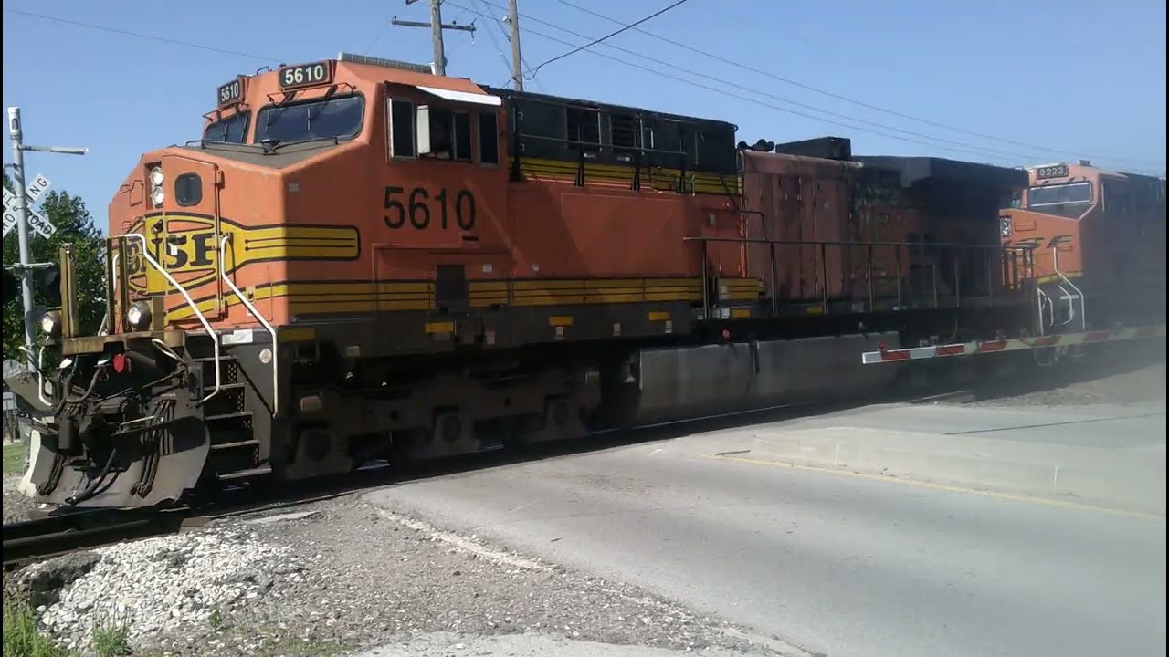 BNSF 5610 AC44 leads a manifest train with a horn salute.