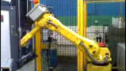 Fanuc robot loads Mori Seiki CNC lathe and Mori Seiki CNC Horizontal pallet changer