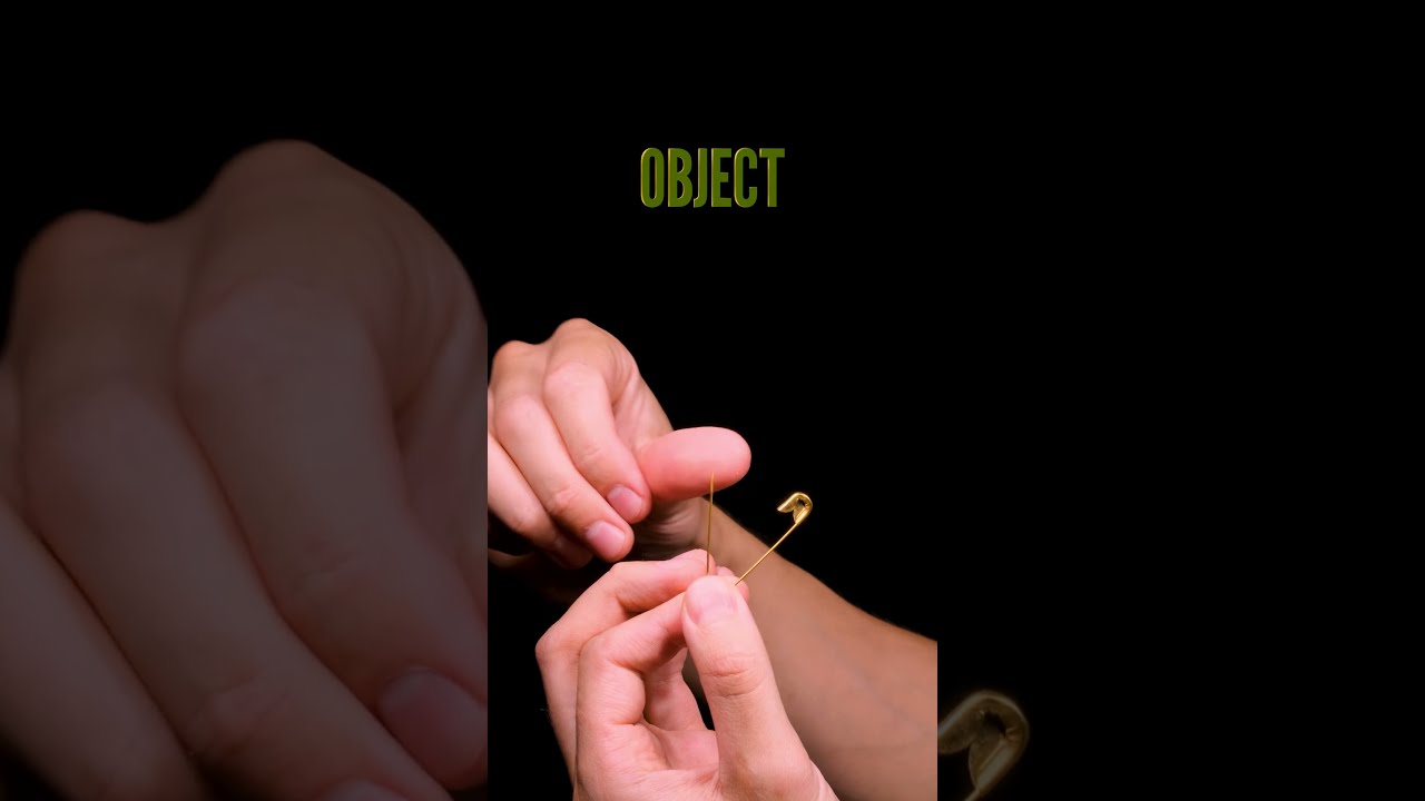 Finger And Needle Close Up