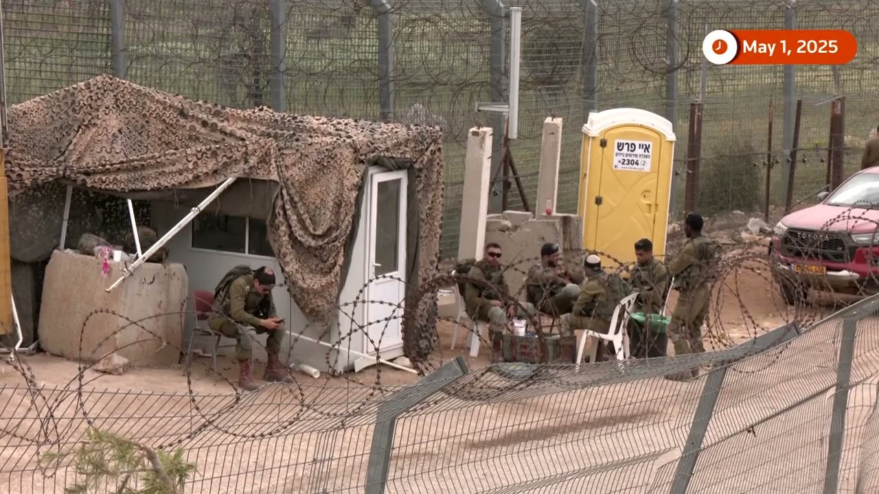 Israeli soldiers seen on border with Syria a day after strike | REUTERS