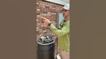 Automated Mosquito Misting system in backyard with pool on brick Ranch. 50 nozzles.