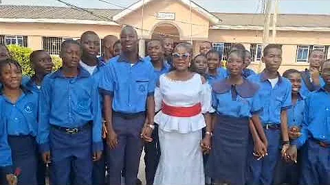 Students and principal of Delsu Secondary School demonstrating Solidarity and Unity.