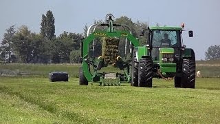 Wrapping and stacking square bales with John Deere and Deutz