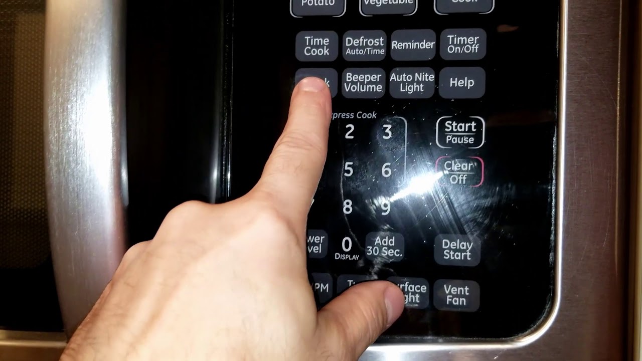 How to set the clock on a microwave - YouTube