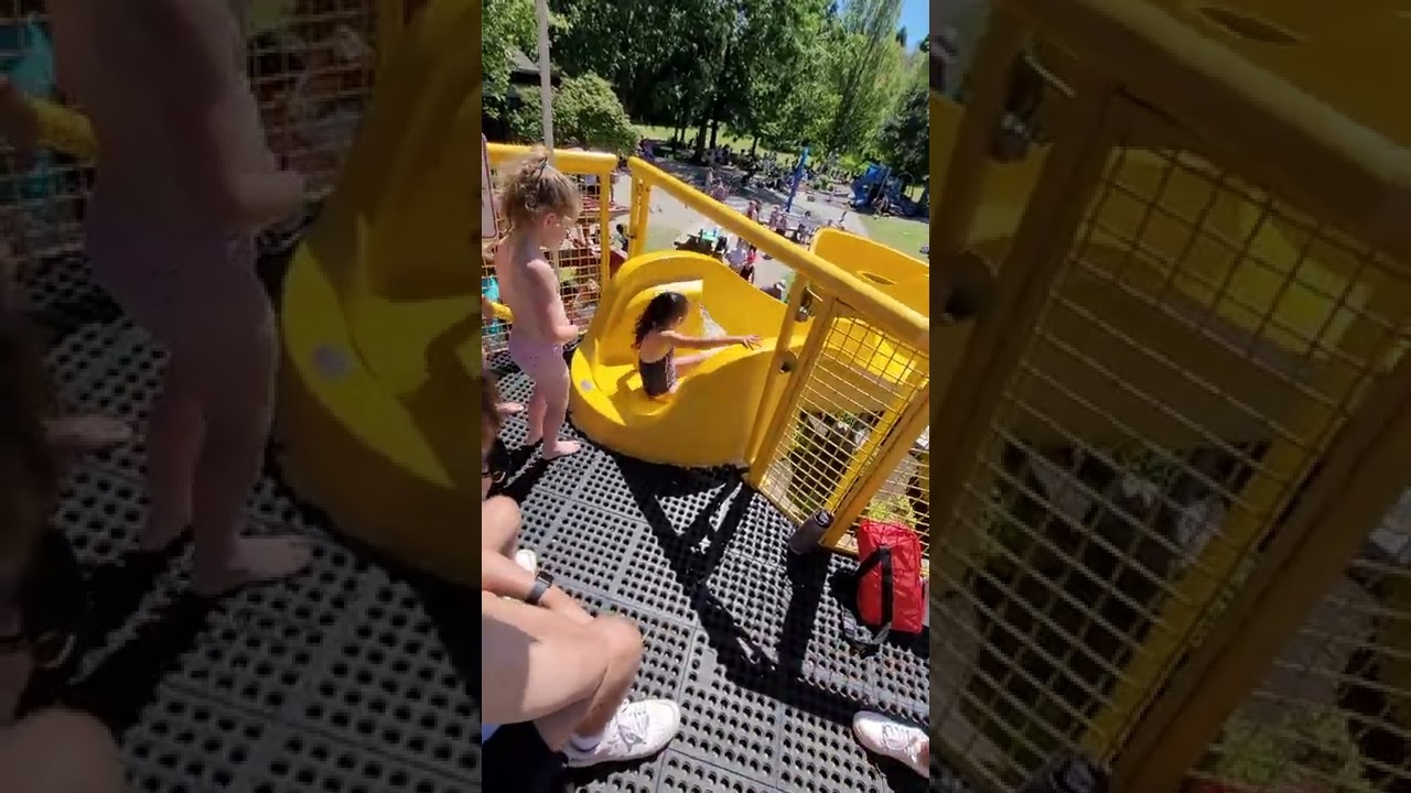 Enjoying the  water slide in Granville Island