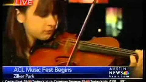 Teen fiddle player performs