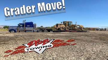 Loading Up A Caterpillar Grader