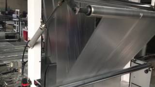 Plastic drawstring bag on roll garbage bag making machine