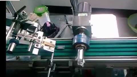 Ballpoint pen cap pen cover automatic horizontal top labeling machine label applicator line