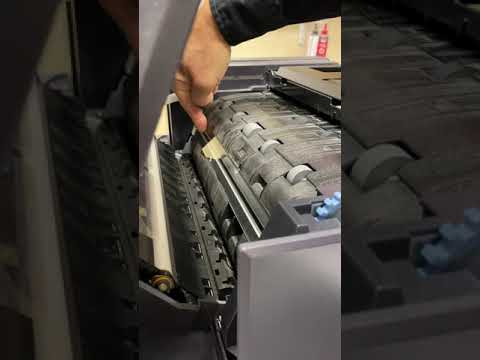 How to clean the feeder glass when you are getting a line with duplexing or scanning.
