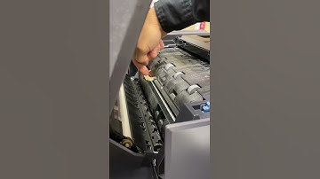 How to clean the feeder glass when you are getting a line with duplexing or scanning.