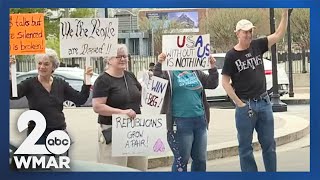 Federal workers protest against layoffs at Penn Station