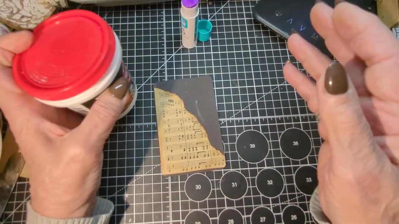 Let's use texture paste and stencils to create a layered look