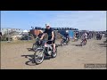 Whitby Steam Fair August 2024 - watching the vintage bikes ride out for parade