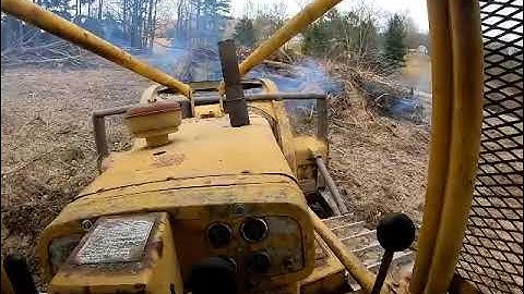 63 cat d6c, working on burning brush pile
