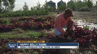 Happy Belly Farms volunteer grows fresh produce to give to metro area food banks