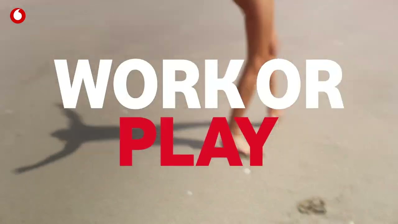 $1 a month deals - Vodafone advert with two women in swimsuits playing at a beach with one of them doing cartwheels.