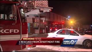 Woman rescued from KC apartment fire