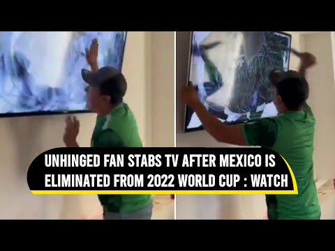 Mexico fan wildly destroys TV with knife in emotional outburst after World Cup heartbreak