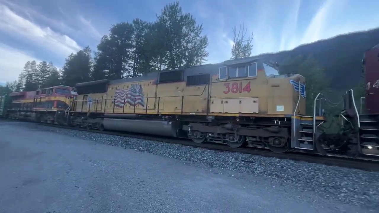  CP 8544 leading a manifest eastbound with UP 3814 on the Cranbrook Sub in Sparwood