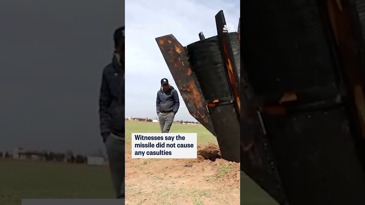 Locals gather around missile that fell in northeastern Syria