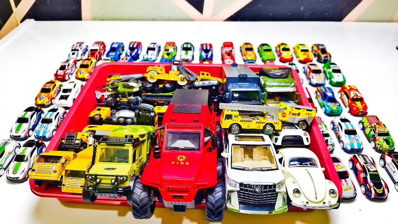 Box Full of model cars : Porsche, Tesla, Peugeot, Volvo, Close-up toy car review Tomica 
