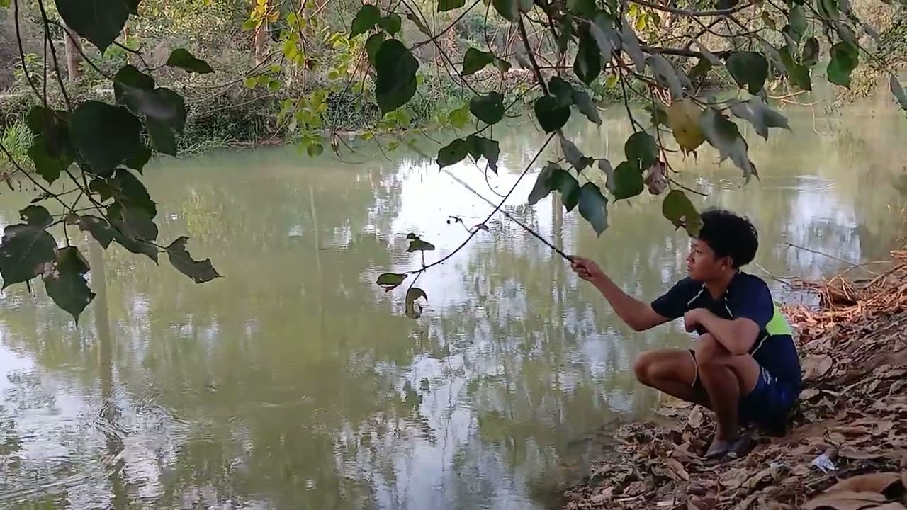 Small boy fishing Action  with brother 