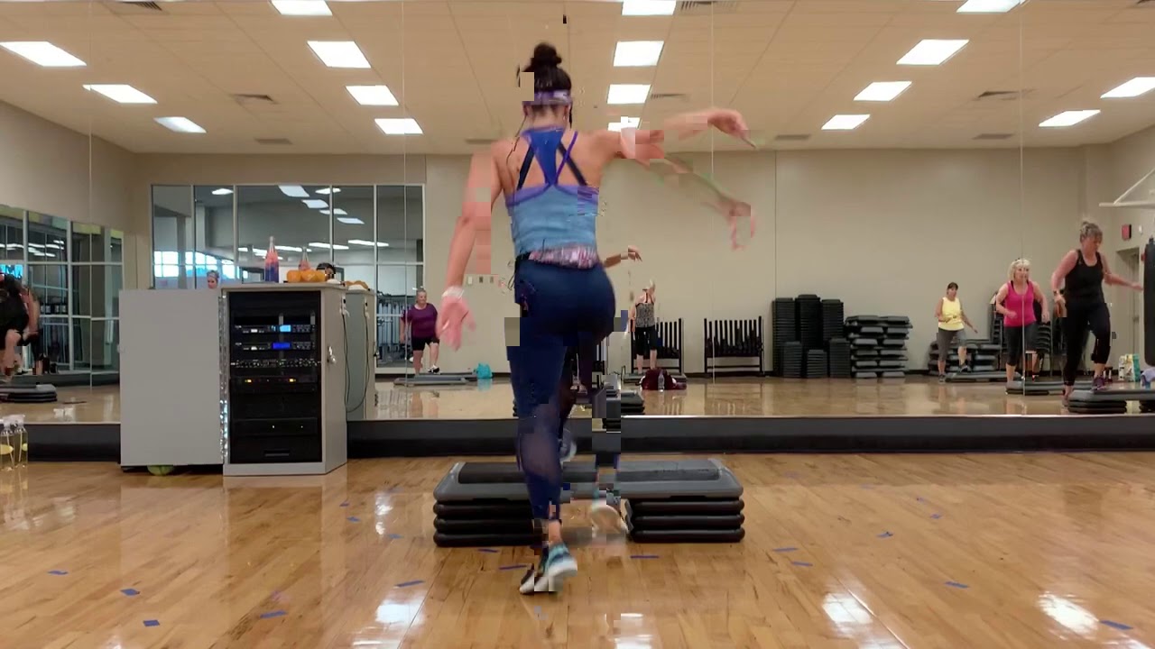 45 minute sweaty step aerobics workout class with strength intervals!