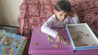 Reva Solving Puzzle Jigsaw Puzzle Solved Peppa Pig Puzzle