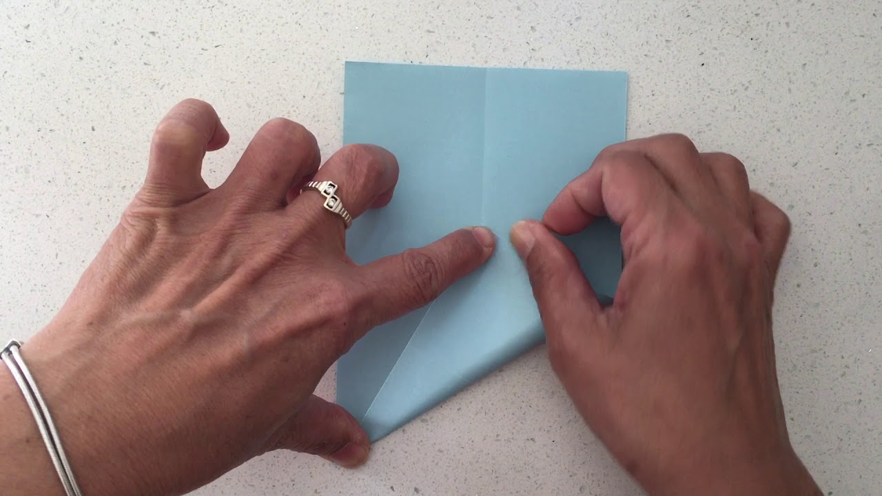 Folding an equilateral triangle
