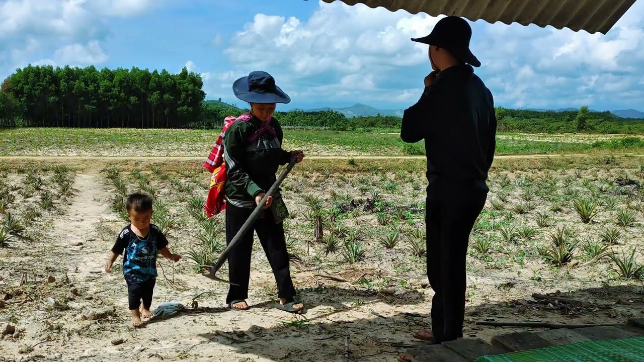 Single Mom Carrying Her Child to Work – Older Brother Waiting in the Hut