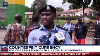 Police arrest four over alleged Euro forgery