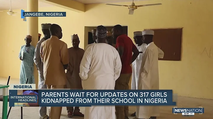Families wait as Nigerian security forces search for 300 abducted girls