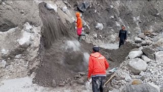 Dropping Stones That Are Attached to the Cliff Wall 