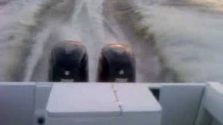 New Suzuki DF200 outboard 4 strokes on Ed Sanford's 1993 2440 Robalo running at 32 Kts.