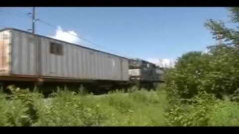 NS 9070 leads a freight meeting with another, GE Locomotive Production Plant, Erie, PA