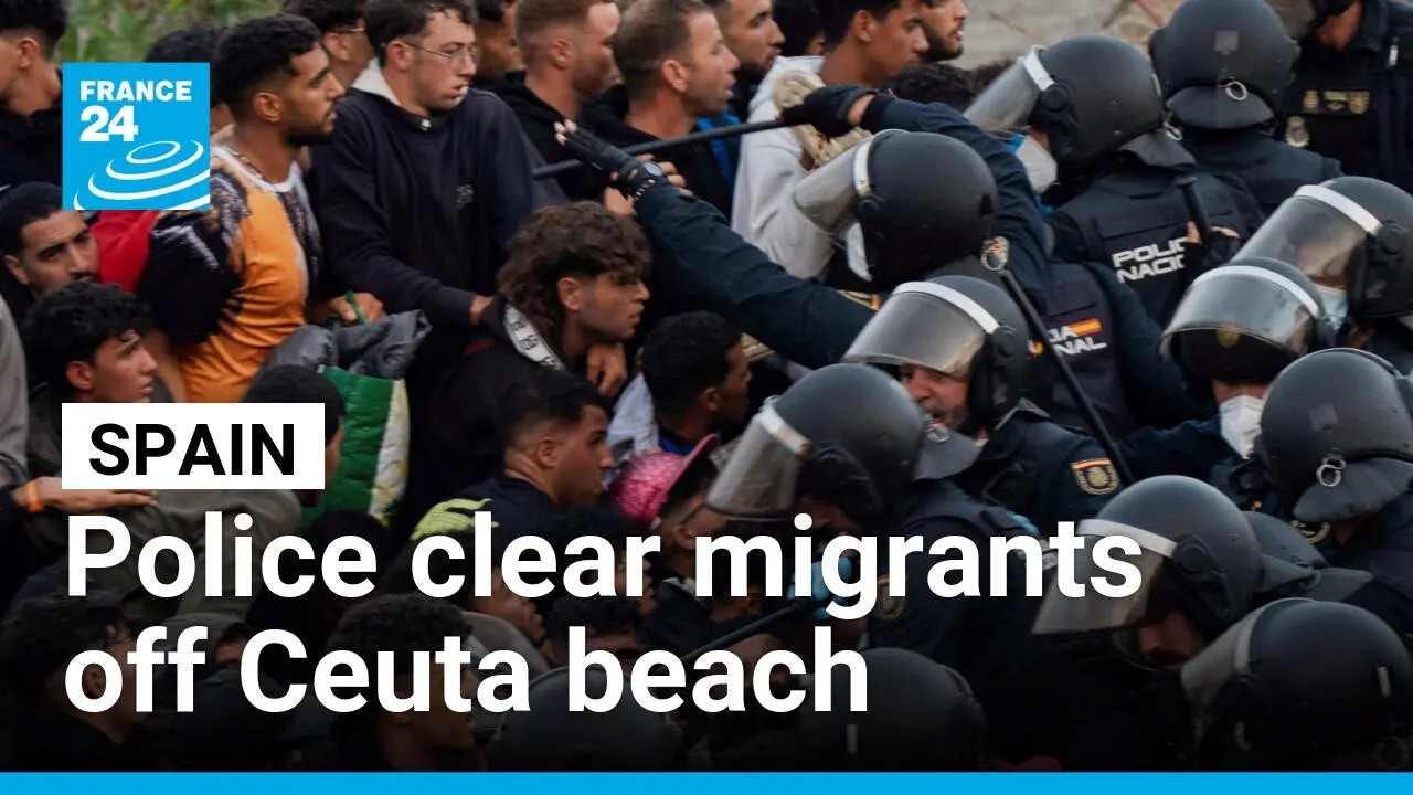 Spain's police launch operation to clear migrants off Ceuta beach • FRANCE 24 English