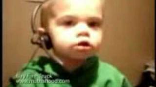 A small kid tries to say ,,fire truck''
