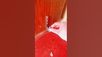 Installation method of spring - back hinge with rotating shaft