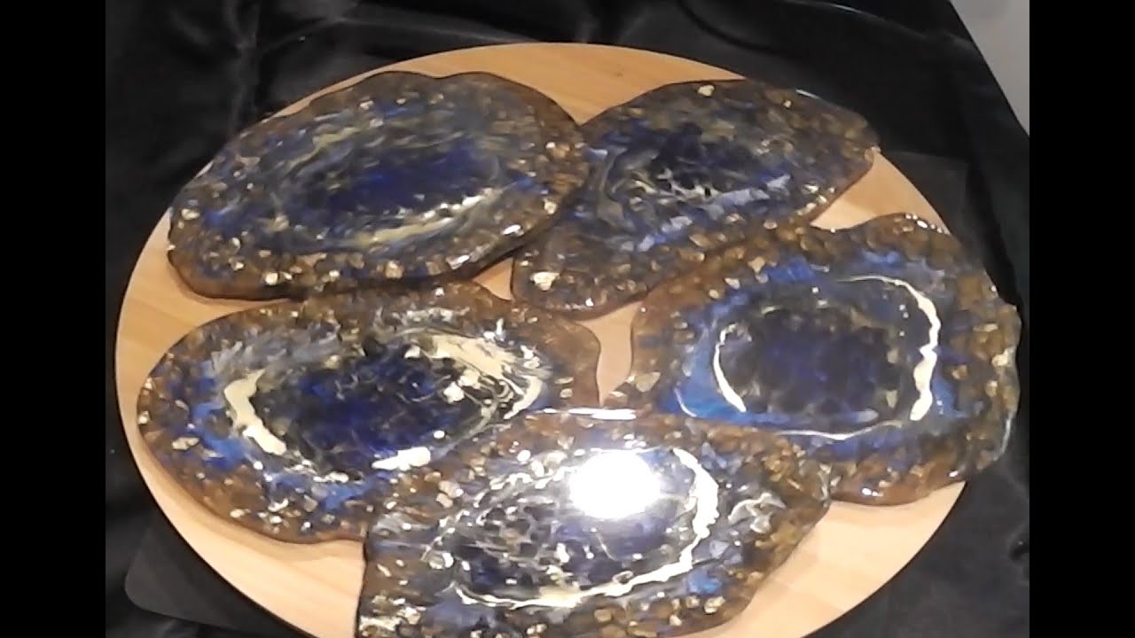 A diy guide to Making Beautiful Blue Geode Bar Coasters out of glass and resin.
