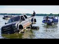 Worlds biggest sema trucks drive in a lake cops dnr helicopter called