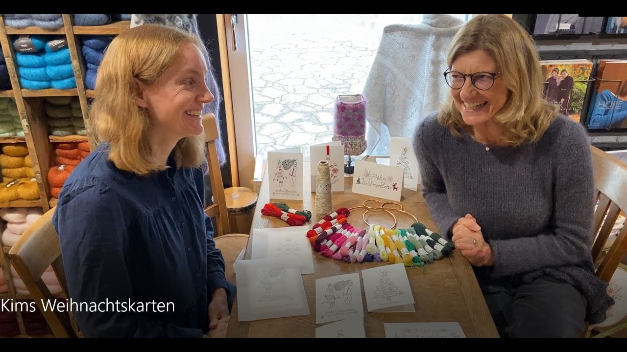 Weihnachtsstimmung in der Mercerie - wir besticken Weihnachtskarten - gezeichnet von Kim Welch.