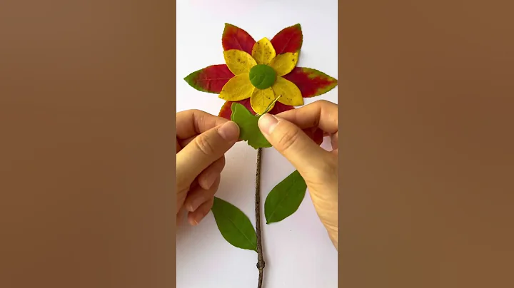 Autumn leaves can also collage beautiful flowers and butterflies!  Leaf stickers Kindergar