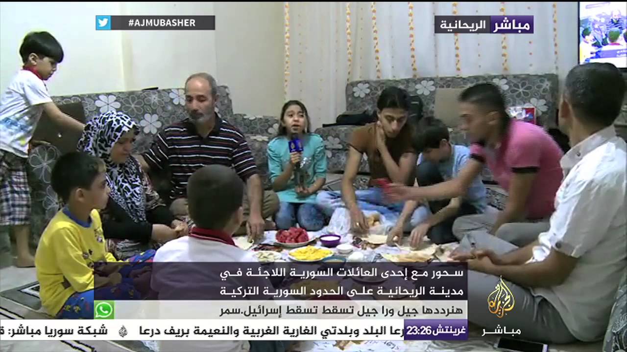 سحور مع إحدى الأسر السورية اللاجئة بمدينة الريحانة على الحدود السورية التركية