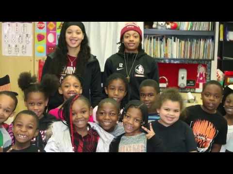 football score Women's Basketball Community Service