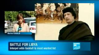 Libya - Interpol issues arrest warrant for Gaddafi
