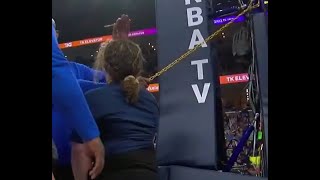 Memphis Grizzlies fan chains herself to basket stanchion at Minnesota Timberwolves NBA Playoffs game