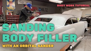 BODY WORK: SANDING BODY FILLER WITH DUAL ACTION ORBITAL SANDER